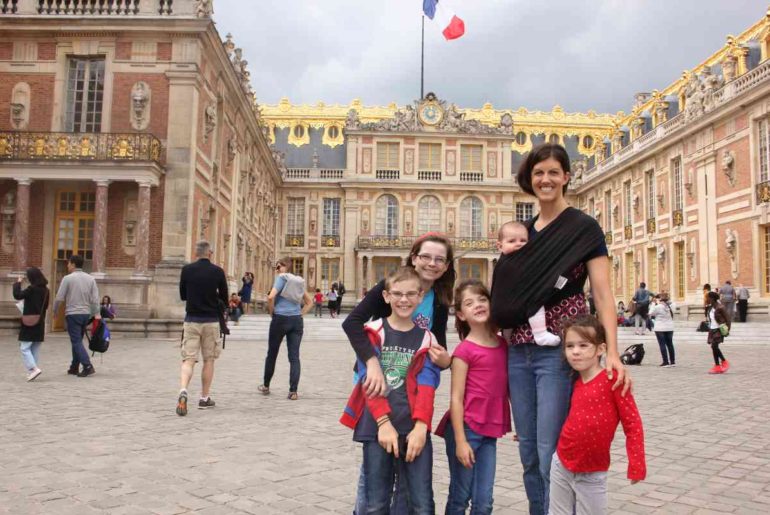 Baby in K'tan baby wrap at Palace of Versailles